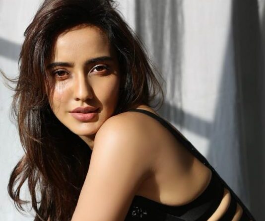 Actress Neha Sharma in a photoshoot portrait